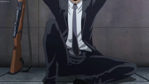 Man In Suit And Tie Wearing Mask GIF