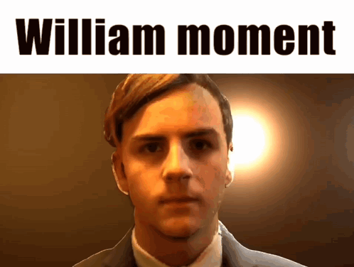 Man in Suit and Tie William Moment