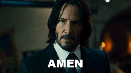 Man in Suit and Tie with Amen