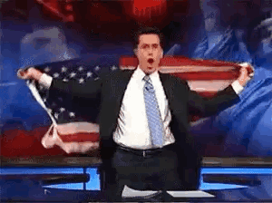 Man in Suit and Tie with American Flag