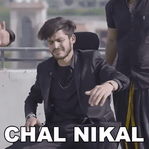 Man In Suit And Tie With Chal Nikal