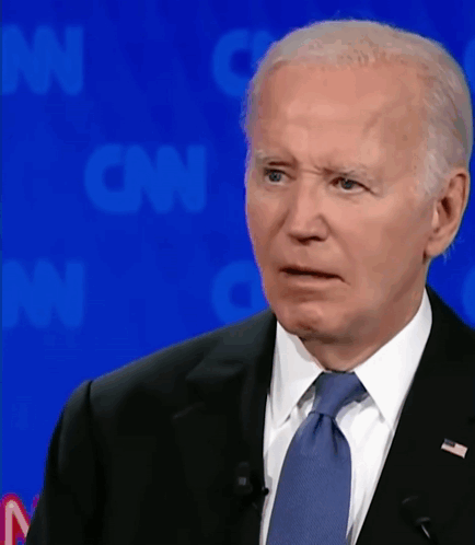Man in Suit and Tie With CNN