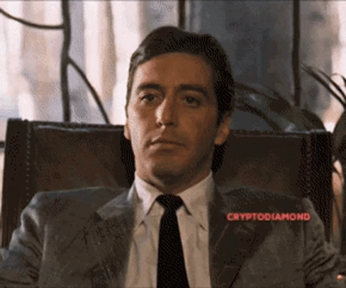 Man in Suit and Tie with Cryptodiamond Above