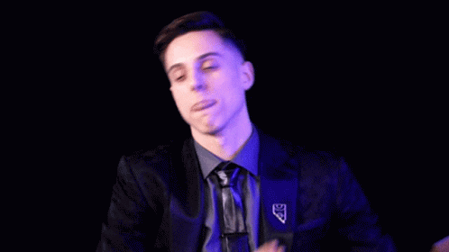 Man in Suit and Tie with DS Pin