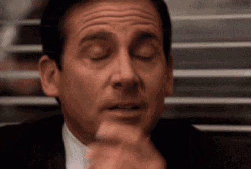 Man In Suit And Tie With Eyes Closed GIF