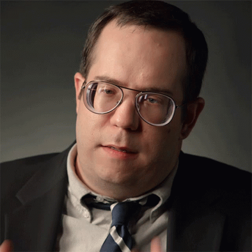 Man in Suit and Tie With Glasses