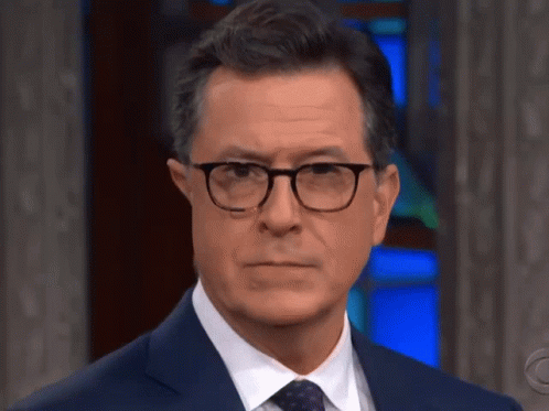Man in Suit and Tie With Glasses