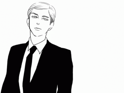 Man in Suit and Tie With Hands in Pockets