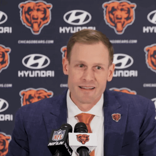 Man in Suit and Tie with Hyundai Bears