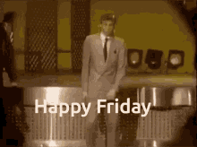 Man in Suit and Tie with Microphone Happy Friday