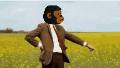 Man in Suit and Tie With Monkey Head