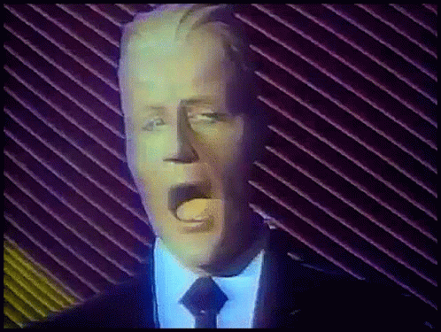 Man In Suit And Tie With Mouth Wide Open GIF