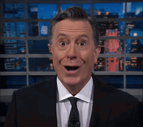 Man in Suit and Tie With Open Mouth