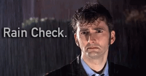 Man in Suit and Tie with Rain Check