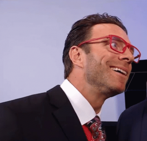 Man In Suit And Tie With Red Glasses GIF