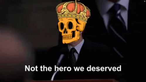 Man in Suit and Tie With Skull Face Saying Not the Hero We Deserved