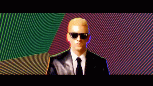 Man in Suit and Tie With Sunglasses