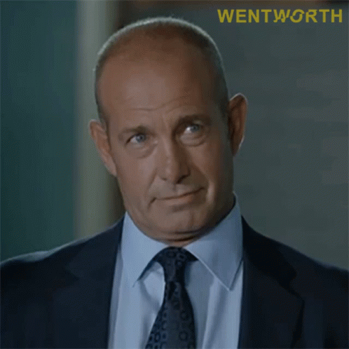 Man in Suit and Tie With Wentworth