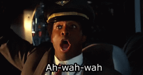 Man In Suit And Tie Yawning GIF