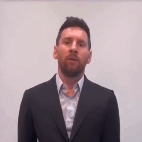 Man in Suit and White Shirt at Whiteboard