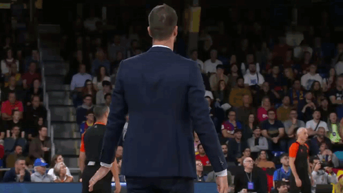 Man In Suit And White Shirt Clapping At Crowd GIF