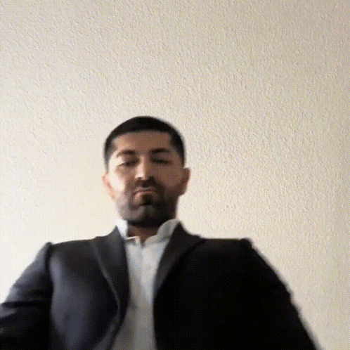 Man in Suit and White Shirt Standing