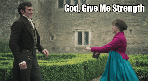 Man in Suit and Woman in Blue Dress Saying God Give Me Strength