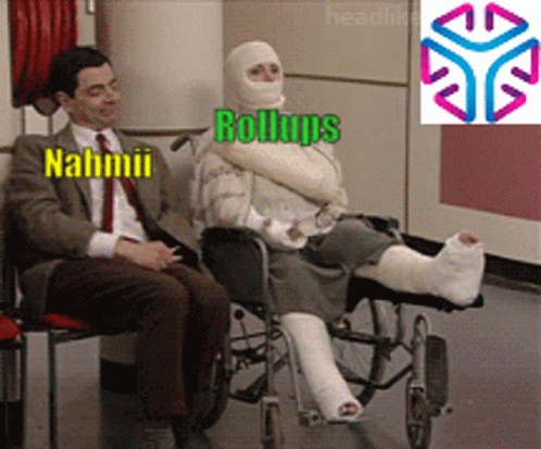 Man In Suit And Woman In Wheelchair With Cast GIF