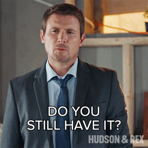 Man in Suit Asking If Still Has It
