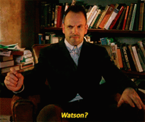 Man In Suit Asking Watson GIF