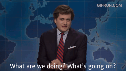 Man In Suit Asking What Are We Doing GIF