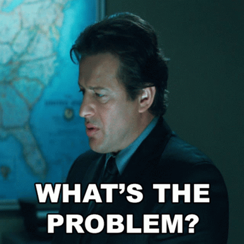 Man in Suit Asking What's the Problem