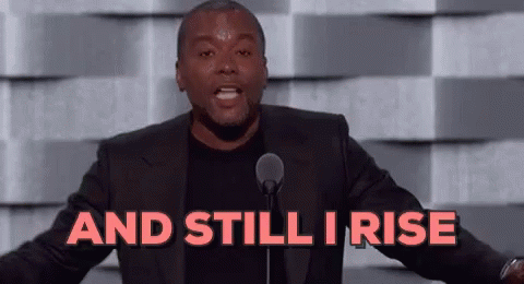 Man In Suit At Microphone Saying And Still I Rise GIF