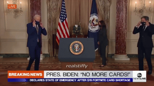 Man in Suit at Podium Saying Realstiffy