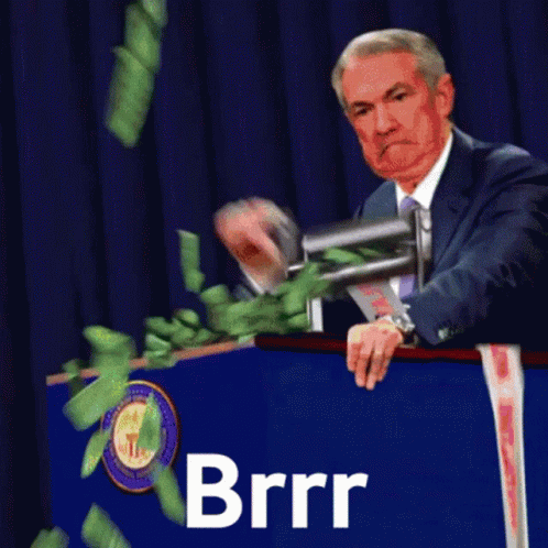 Man in Suit at Podium With Money Falling Brrr