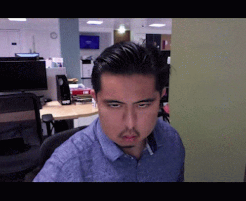 Man In Suit Before Fox News Banner GIF