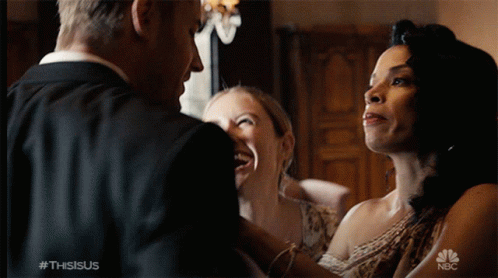 Man in Suit Between Two Women #ThisIsUs
