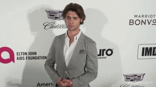 Man In Suit By Elton John AIDS Foundation Ad GIF