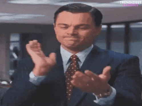 Man In Suit Clapping Hands GIF