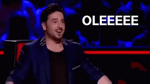 Man In Suit Clapping In Front Of Crowd GIF