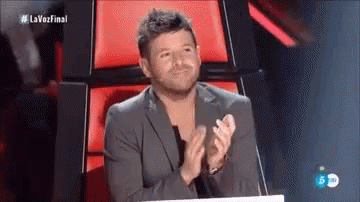 Man in Suit Clapping
