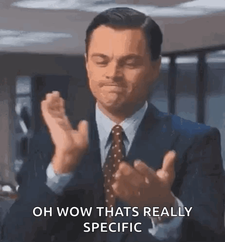 Man In Suit Clapping Saying Oh Wow GIF