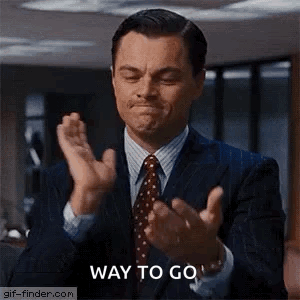 Man in Suit Clapping Saying Way to Go