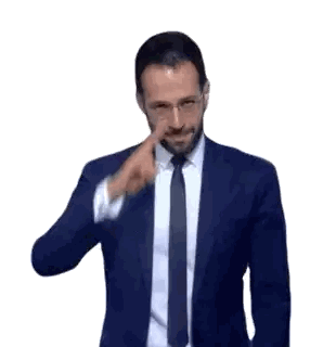 Man in Suit Covering Eyes