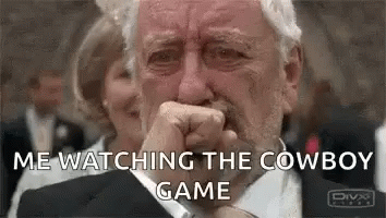 Man in Suit Crying Watching Cowboy Game
