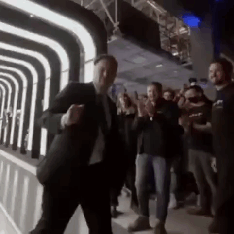 Man in Suit Dancing at Party