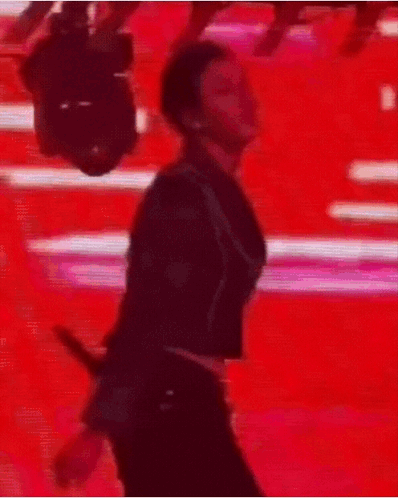 Man In Suit Dancing In Front Of Camera GIF