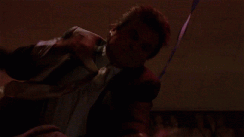 Man In Suit Dancing In Red Room GIF
