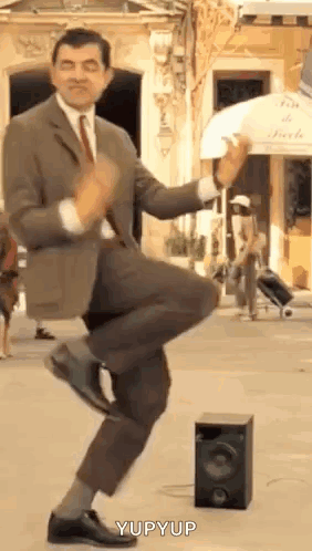 Man In Suit Dancing In Street GIF