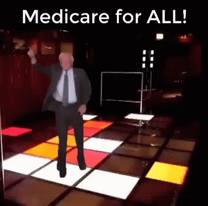 Man in Suit Dancing Saying Medicare for All